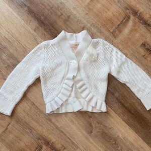 Ivory Ruffle Knit Cardigan with Flower Accent